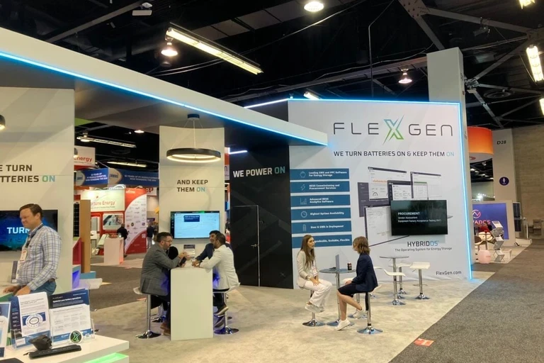 People at FlexGen RE+ conference booth