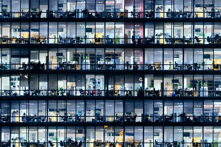 wide shot of people in business building