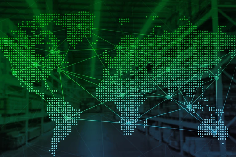 Dot map of globe over image of warehouse